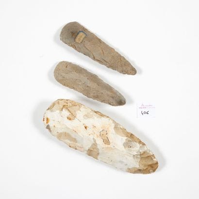 Set of three carved axes 

Grey flint

France...