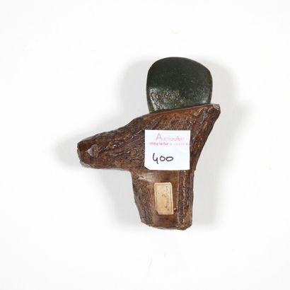 Axe 

polished with its eccentric heel grip

Greenstone...