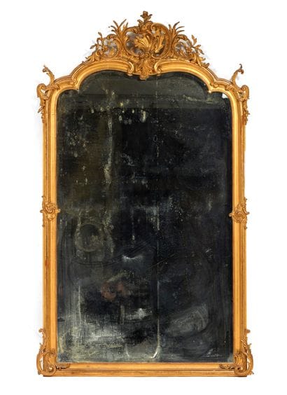 Grand miroir

en stuc et bois doré mouluré...