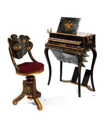 Petit harmonium 

à soufflets en bois laqué...