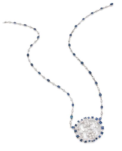 Collier 

en or gris 18K (750) serti en alternance...