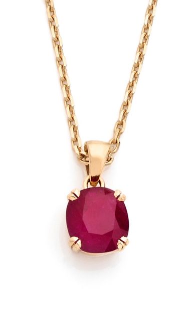 Pendentif 

en or 18K (750) orné d'un rubis...