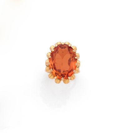 Bague 

en fils d'or 18K (750), ornée d'une...