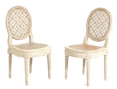Pair of chairs
with medallion back in molded...
