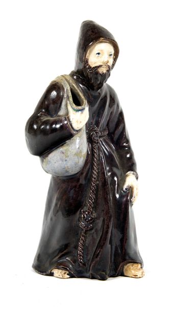 Pré d'auge : 
Figure représentant un moine...