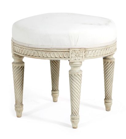 Stool 
Round-shaped stool in cream-colored...