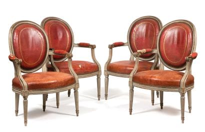 Suite of four armchairs 
with medallion back...