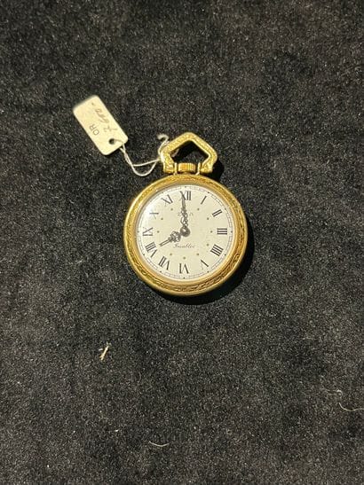 Small neckwatch in 18k 750°° yellow gold...