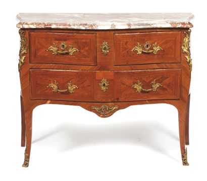 Rosewood and violetwood veneered curved chest...