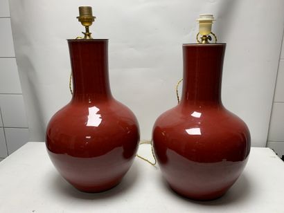 Pair of large oxblood porcelain lamp bases...