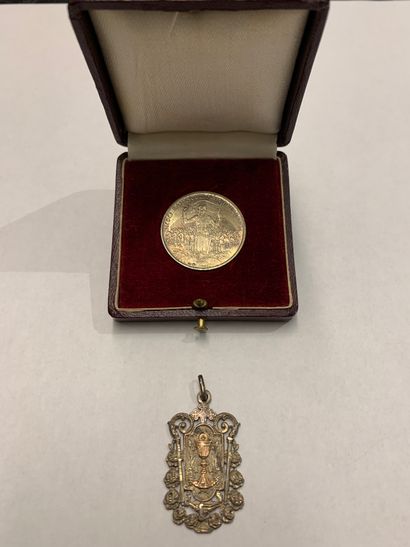 Silver medal with applied chalice decoration...