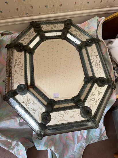 Octagonal mirror in green threaded glass...