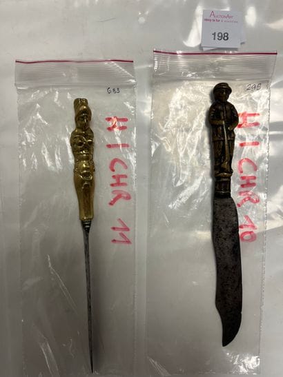 Set of 2 knives, bronze handles, one decorated...