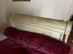Bench seat in cream lacquered wood, the uprights...