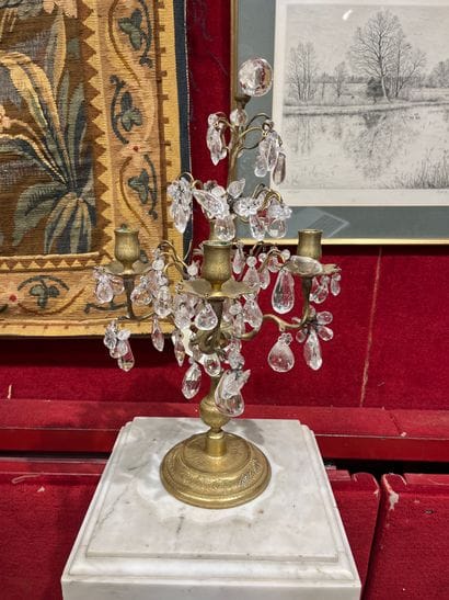 A pair of ormolu girandoles with four branches...