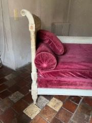 Bench seat in cream lacquered wood, the uprights...