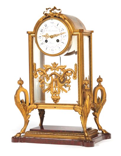 Cage-shaped clock in chased and gilded bronze,...