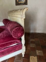 Bench seat in cream lacquered wood, the uprights...