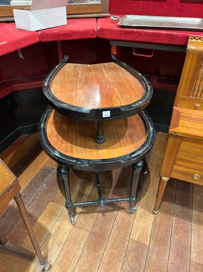 Horseshoe-shaped end table with two superimposed...