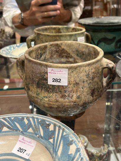 Turquoise pitcher with two handles
Siliceous...