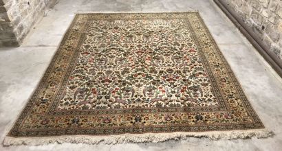 Wool and silk carpet decorated with animals...
