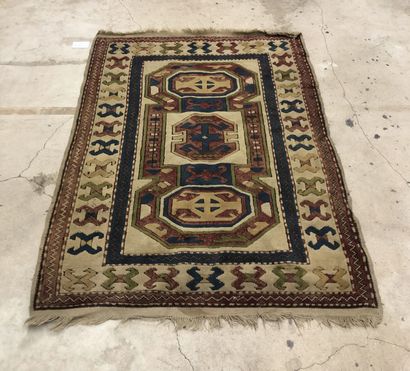 Thick wool carpet decorated with geometric...