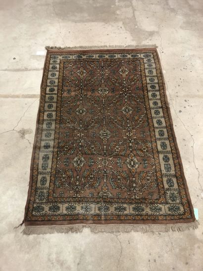 Brown wool carpet with floral design, beige...