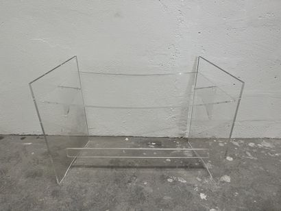Desk 
Plexiglas, curved top, straight uprights...