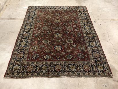 Wool and silk carpet decorated with plants...