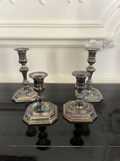 Two pairs of silver-plated candlesticks
20th...