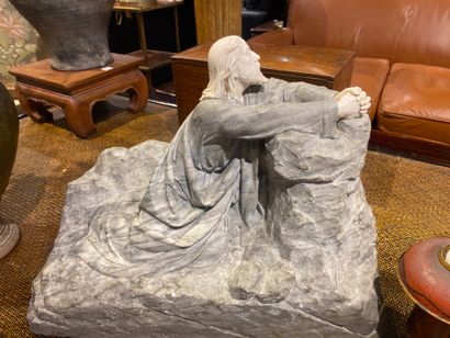 Christ en prière sculpté dans un bloc de...