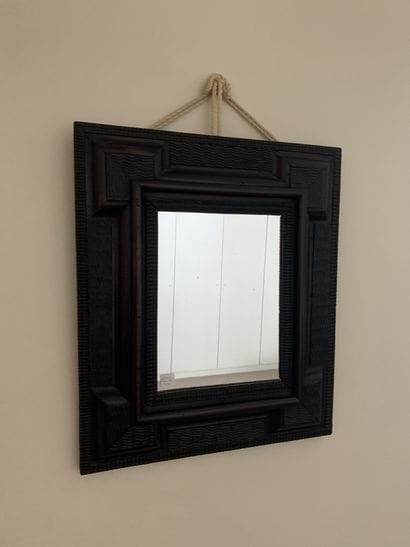 Molded and guilloche wood mirror in the XVIIth...