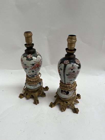 Pair of small Imari porcelain baluster vases.
Gilt...
