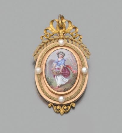 ROUVENAT
Pendentif en or 18K (750), orné...