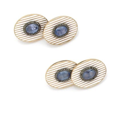 Paire de boutons de manchettes 
en or 14K...