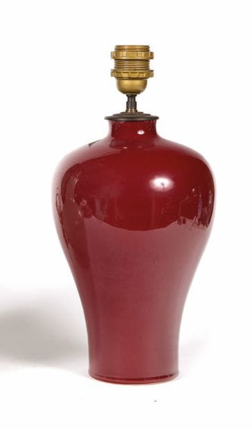 China
Oxblood porcelain baluster vase.
Modern...