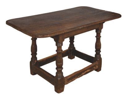 Oak writing table, the rectangular top rests...