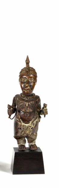 Benin
Small modern Uruba bronze sculpture.
Wooden...