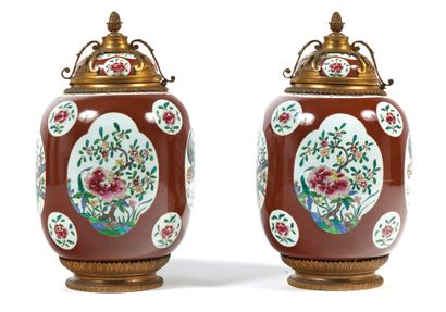 China
A pair of vases in green family enamels,...