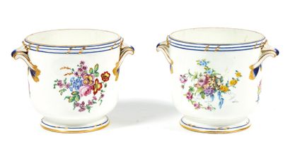 Sèvres
Two soft paste bottle coolers with...