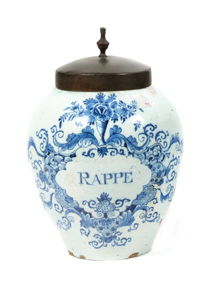 Delft
An ovoid earthenware tobacco pot decorated...