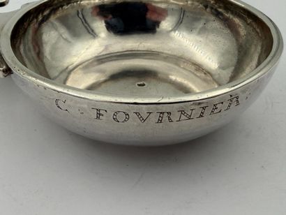 DIJON 1750
Silver wine cup resting on a bat,...
