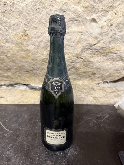 1 bottle Bollinger Grande Année 1996 stained...