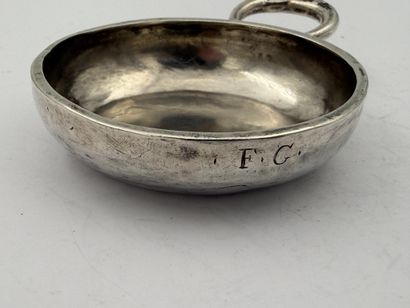 Small silver wine cup, the plain body engraved...