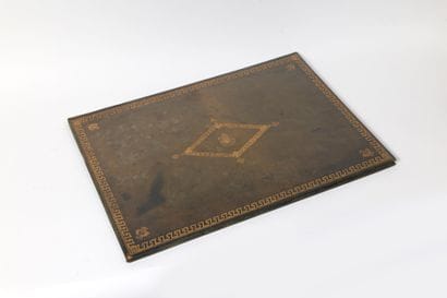 Bettenfeld Paris 
Gold-embossed green leather...