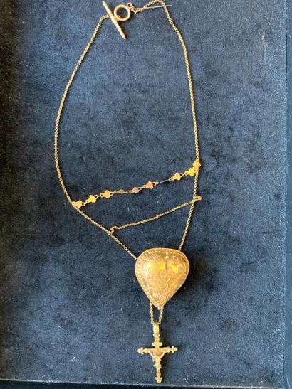 Coulant 
en forme de cœur en or 18K (750),...