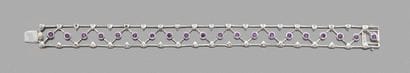 Fin bracelet 
en résille d'or gris 18K (750)...