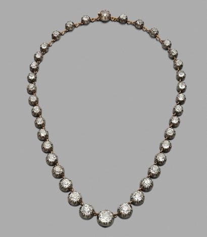 Collier rivière 
en argent et en or 18K (750),...