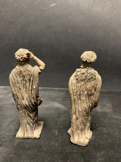Deux statuettes
en argent et terre cuite...