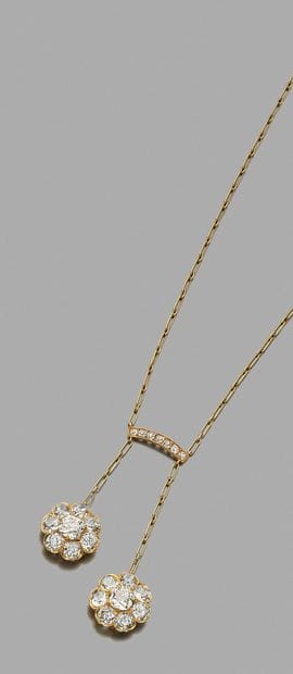 Collier négligé 
en or 18K (750), orné de...